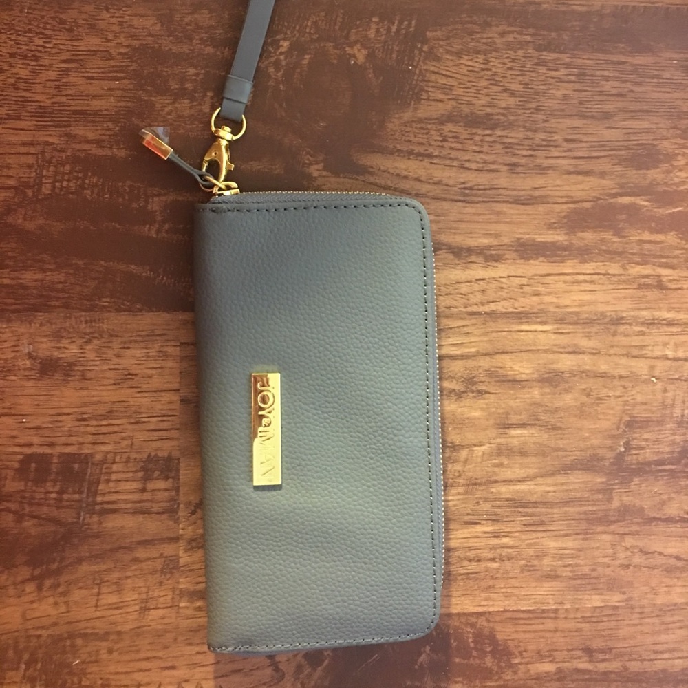 New Joy & Iman Leather Wristlet